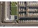 Aerial view of the community featuring a school, playground, and residential units at 8116 Haywood Estate Ave, Las Vegas, NV 89113
