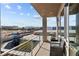 Balcony showcasing neighborhood and playground views from this cozy outdoor space at 8116 Haywood Estate Ave, Las Vegas, NV 89113