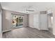Spacious bedroom with contemporary flooring and seamless access to a private plunge pool via sliding glass doors at 8116 Haywood Estate Ave, Las Vegas, NV 89113