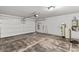 Spacious two-car garage featuring epoxy floors, storage and water filtration system for added convenience at 8116 Haywood Estate Ave, Las Vegas, NV 89113