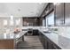 Well-equipped kitchen with granite countertops, custom cabinets, and modern stainless steel appliances at 8116 Haywood Estate Ave, Las Vegas, NV 89113