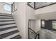 Modern staircase with sleek railings and an open floor plan at 8116 Haywood Estate Ave, Las Vegas, NV 89113
