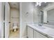 A well-lit bathroom showcases a white marble countertop and single sink vanity at 9629 Grouse Grove Ave, Las Vegas, NV 89148