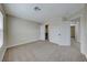 Comfortable bedroom with soft carpet, closet and adjacent bathroom at 9629 Grouse Grove Ave, Las Vegas, NV 89148