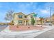 Charming two-story home with neutral stucco, tile roof and tidy desert landscaping in a suburban neighborhood at 9629 Grouse Grove Ave, Las Vegas, NV 89148