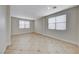 This living room's neutral paint and window trim make it easy to decorate to your personal style at 9629 Grouse Grove Ave, Las Vegas, NV 89148