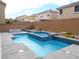 A pool and spa located in backyard of home at 9739 Fox Estate St, Las Vegas, NV 89141