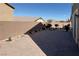 Backyard features a block wall and a patio area at 22 Kaku Ridge Way, Las Vegas, NV 89183
