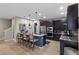 Stylish kitchen featuring stainless steel appliances and a breakfast bar with seating at 11283 Gravitation Dr, Las Vegas, NV 89135