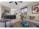 Comfortable living area with hardwood floors and built in bar at 11283 Gravitation Dr, Las Vegas, NV 89135