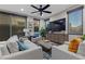 Cozy living room with comfortable seating, stylish decor, and natural light at 11283 Gravitation Dr, Las Vegas, NV 89135