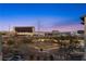 Scenic view showcasing the city skyline and community walking paths at 11283 Gravitation Dr, Las Vegas, NV 89135