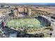 Aerial view of a well-maintained golf course in a community with the city skyline in the background on a clear day at 125 E Harmon Ave # 2902, Las Vegas, NV 89109