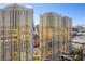 Luxury condo towers feature gold tinted windows and offer views of the Las Vegas skyline at 135 E Harmon Ave # 221, Las Vegas, NV 89109