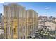 Luxury condo towers featuring gold tinted windows offering city views and a peek at the Las Vegas strip at 135 E Harmon Ave # 221, Las Vegas, NV 89109