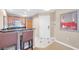 Well-equipped kitchenette features sleek countertops and stainless steel appliances at 135 E Harmon Ave # 221, Las Vegas, NV 89109