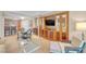 Wide angle shot of living space combining kitchen and dining at 135 E Harmon Ave # 221, Las Vegas, NV 89109