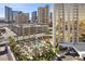 Well-maintained pool area with palm trees, lounge seating, landscaping, and convenient parking at 135 E Harmon Ave # 221, Las Vegas, NV 89109
