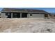 Charming single-story home with modern design elements under a clear blue sky at 1351 Huckleberry St, Pahrump, NV 89048