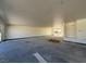 This is an attached three car garage ready for customization and storage at 1351 Huckleberry St, Pahrump, NV 89048