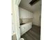 Laundry room featuring ample white cabinets, counter space and sink at 1351 Huckleberry St, Pahrump, NV 89048