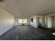 The expansive living room features hardwood floors, recessed lighting and lots of natural light at 1351 Huckleberry St, Pahrump, NV 89048