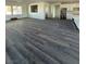 The expansive living room features hardwood floors, recessed lighting and lots of natural light at 1351 Huckleberry St, Pahrump, NV 89048
