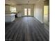 The living room features hardwood floors, recessed lighting and ample natural light at 1351 Huckleberry St, Pahrump, NV 89048
