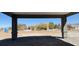 Eye-level view from the carport, offering a glimpse of the neighboring property at 1351 Huckleberry St, Pahrump, NV 89048