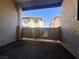 Outdoor balcony with view of other properties featuring desert landscaping and stucco walls at 1403 Santa Margarita St # D, Las Vegas, NV 89146