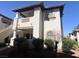 Charming condo featuring a second-story balcony, arched windows, and well-maintained landscaping at 1403 Santa Margarita St # D, Las Vegas, NV 89146
