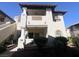 Charming condo featuring a second-story balcony, arched windows, and well-maintained landscaping at 1403 Santa Margarita St # D, Las Vegas, NV 89146