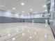 Large indoor basketball court with hoops, benches, and nets for community members at 150 Short Ruff Way, Las Vegas, NV 89148