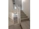Staircase with wooden steps and white railings leading to the upper floor at 150 Short Ruff Way, Las Vegas, NV 89148
