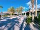 Beautiful, brick-paved walkway leading to a commercial building with well-manicured greenery at 150 Short Ruff Way, Las Vegas, NV 89148