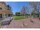 Spacious backyard featuring desert landscaping and artificial turf, perfect for outdoor relaxation and entertaining at 1598 Bermuda Dunes Dr, Boulder City, NV 89005