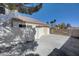 Backyard featuring a concrete slab and perimeter walls, offering a private outdoor space at 1598 Bermuda Dunes Dr, Boulder City, NV 89005