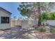 Enclosed yard space featuring brick paving, desert landscaping, and privacy wall, perfect for outdoor enjoyment at 1598 Bermuda Dunes Dr, Boulder City, NV 89005