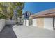 A nice area in the backyard with pavers and access to the side yard at 1598 Bermuda Dunes Dr, Boulder City, NV 89005