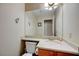 Half bathroom featuring a marble countertop and wood vanity at 1598 Bermuda Dunes Dr, Boulder City, NV 89005
