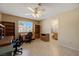 Bedroom space with a ceiling fan and lots of space for activities at 1598 Bermuda Dunes Dr, Boulder City, NV 89005