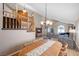Inviting dining area with chandelier and views into the formal living room at 1598 Bermuda Dunes Dr, Boulder City, NV 89005