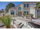 Close-up of a home's front entrance, highlighting the landscaped steps and stucco exterior at 1598 Bermuda Dunes Dr, Boulder City, NV 89005
