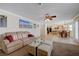 Spacious living room featuring an open layout, ceiling fan, and neutral colors at 1598 Bermuda Dunes Dr, Boulder City, NV 89005