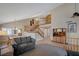 Spacious living room features high ceilings, a staircase, wood floors, and ample natural light at 1598 Bermuda Dunes Dr, Boulder City, NV 89005