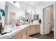 Double sink bathroom with great lighting, spacious vanity, and tile countertops at 1893 Donnington Ct, Las Vegas, NV 89123