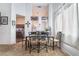 Dining area with table and seating adjacent to open floor plan at 1893 Donnington Ct, Las Vegas, NV 89123
