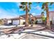 Inviting single-Gathering home with a well-maintained front yard and desert landscaping at 1893 Donnington Ct, Las Vegas, NV 89123