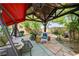 Relaxing backyard featuring a shaded gazebo with comfortable seating at 2024 Riva Del Garda Pl, Las Vegas, NV 89134