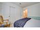 Bright bedroom with white walls, light carpet, and ample closet space at 2024 Riva Del Garda Pl, Las Vegas, NV 89134